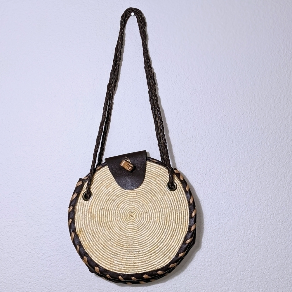 Handwoven Round Straw Crossbody with a Dark Leather Strap and Flap - Picture 4 of 4